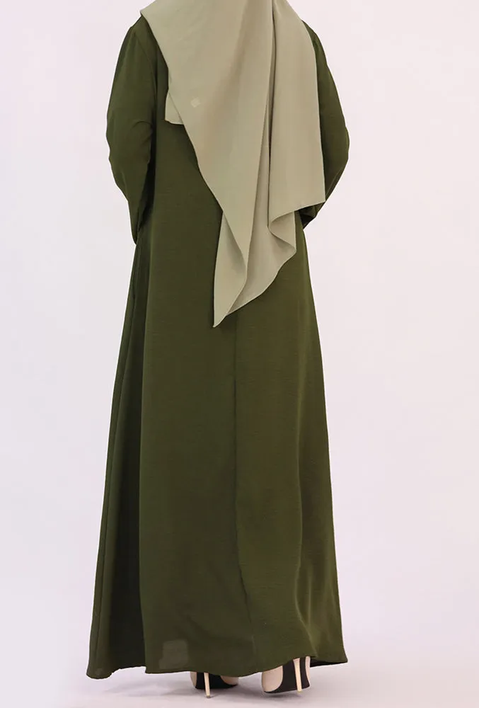 Army Green Kira loose slip dress with pockets in maxi length and with long sleeve