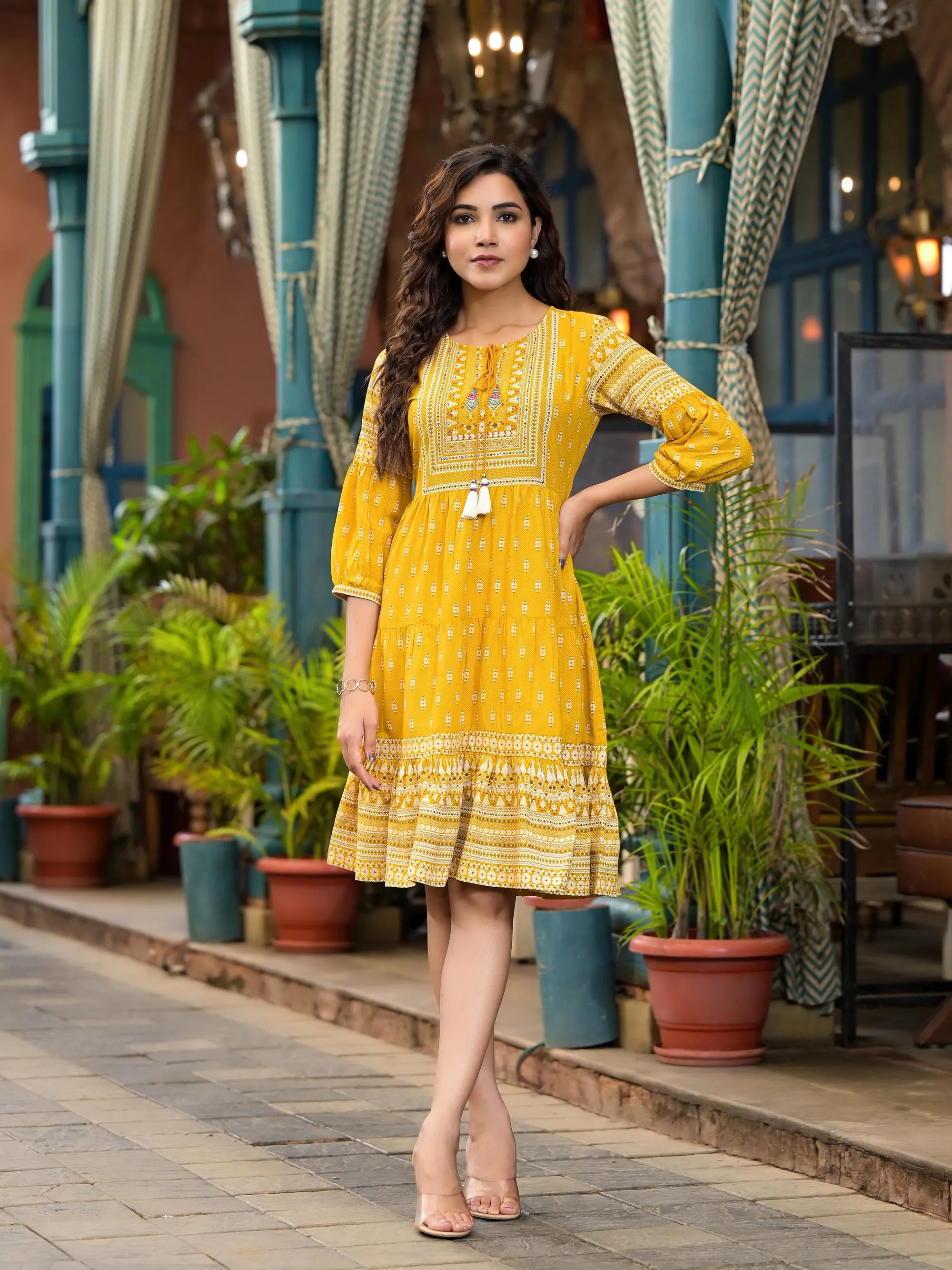 Mustard Ethnic Motif Printed Liva Rayon Dress With Thread Work & Tassels